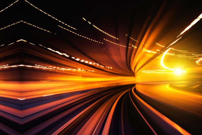 Abstract Speed motion through a tunnel